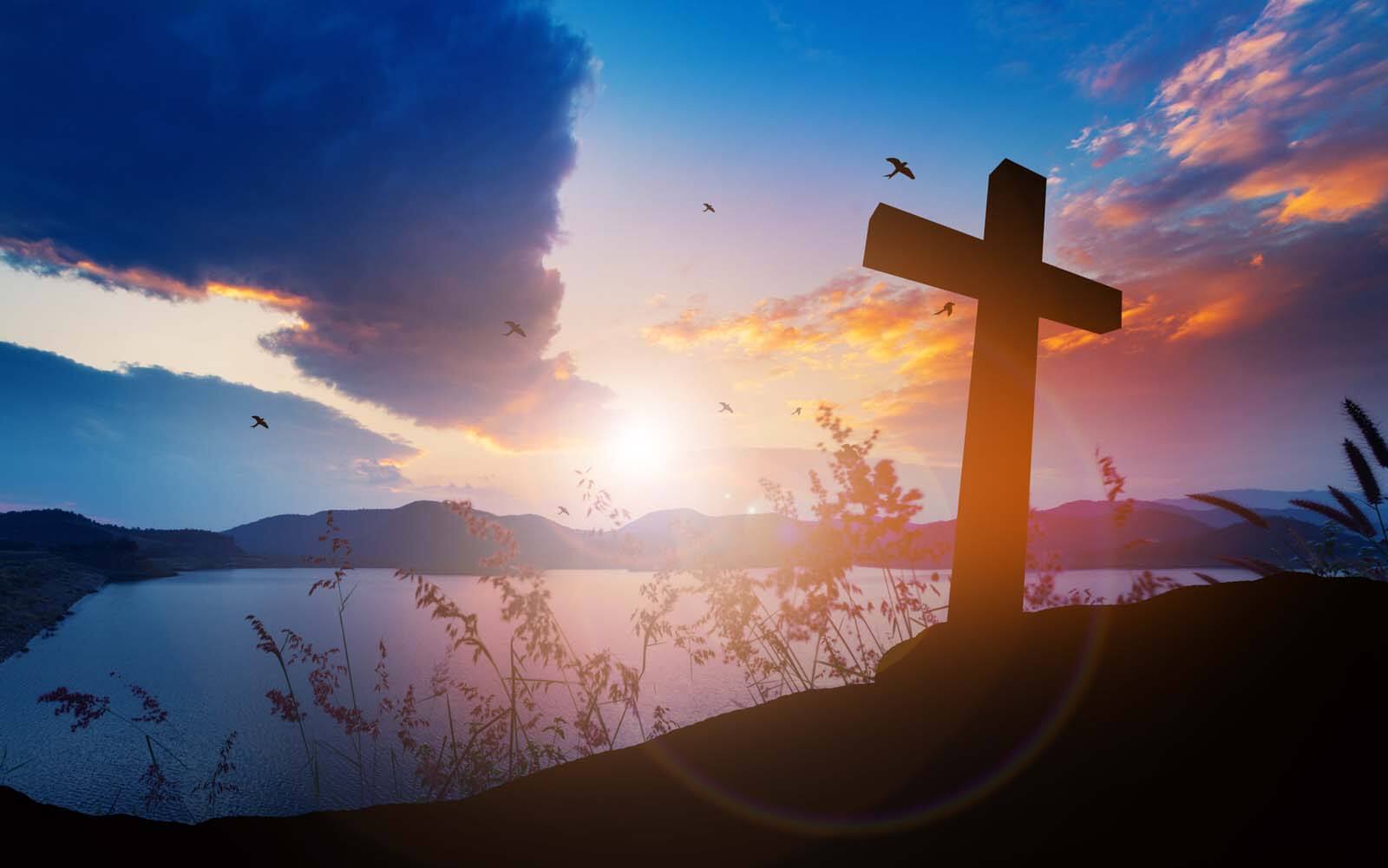 Cross silhouette sunset